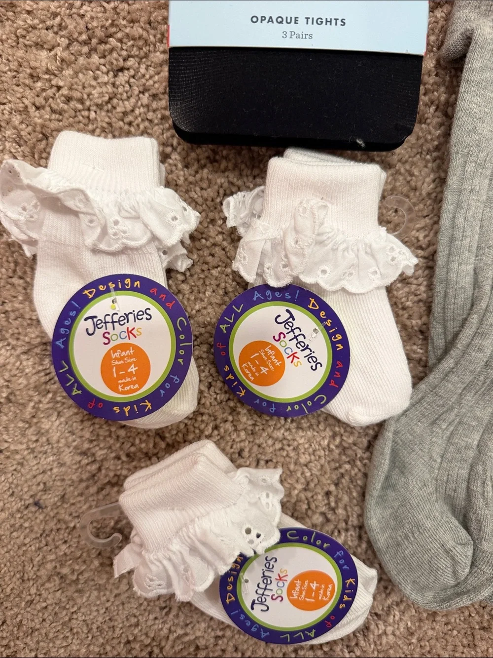 Newborn bundle of socks, tight, and leggings
